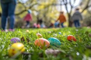 Easter egg hunt in a park with families enjoying the spring weather photo
