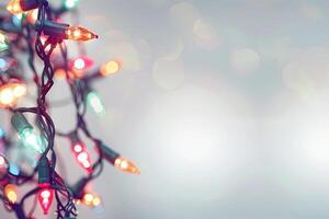 Festive Christmas lights against a soft transparent white backdrop, adding sparkle to designs photo