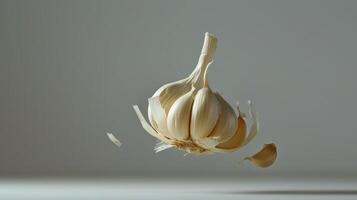 Clean and basic shot of a spinning piece of garlic photo