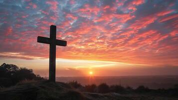 Ample room for text beside an image of a cross-shaped silhouette against a sunset sky photo