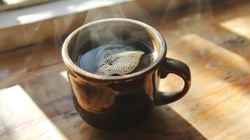Bird's eye view of a mug filled with steaming hot coffee photo