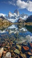 Crystal-clear lakes reflecting towering peaks photo