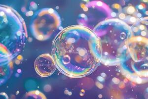 Rainbow-colored bubbles transparently floating in the air photo