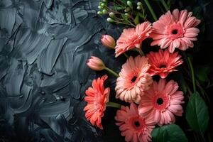 top view of composition of different bright flowers on black background. photo