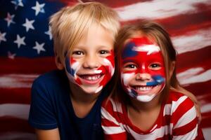 Happy children celebrating independence day with a face painted in the colors of the American flag. photo