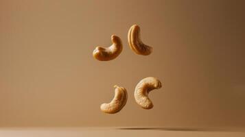 Minimalist shot of floating cashew in a minimalist brown composition photo