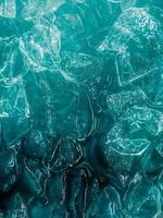 icecubes background,icecubes texture,icecubes wallpaper,ice helps to feel refreshed and cool water from the icecubes helps the water refresh your life and feel good.ice drinks for refreshment business photo