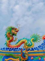 Dragon statue, dragon symbol, dragon Chinese, is a beautiful Thai and Chinese architecture of shrine, temple. A symbol of good luck and prosperity during the Chinese New Year celebrations. photo