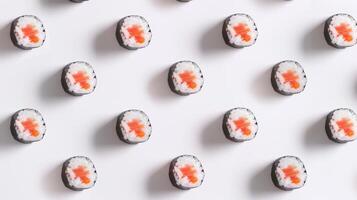 Minimalist arrangement of spinning sushi rolls in a minimalist pattern photo