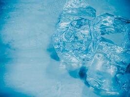 icecubes background,icecubes texture,icecubes wallpaper,ice helps to feel refreshed and cool water from the icecubes helps the water refresh your life and feel good.ice drinks for refreshment business photo