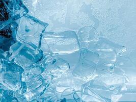 icecubes background,icecubes texture,icecubes wallpaper,ice helps to feel refreshed and cool water from the icecubes helps the water refresh your life and feel good.ice drinks for refreshment business photo