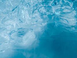 icecubes background,icecubes texture,icecubes wallpaper,ice helps to feel refreshed and cool water from the icecubes helps the water refresh your life and feel good.ice drinks for refreshment business photo