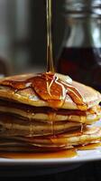 National Pancake Day stacks and syrup drizzles photo