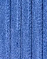 Texture of expensive natural knitted blue fabric with a striped pattern and a beautiful weave photo