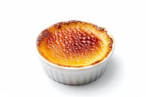 Creme Brulee, French vanilla custard cake with caramelized condensed milk isolated on a white background photo