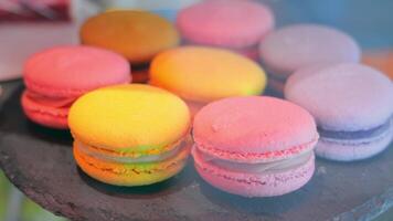 Colored Macaroons Lie On The Shop Window. Sweets In The Shop Window. video
