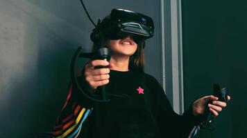 A Teenage Girl Plays A Game Using Virtual Reality Glasses. Vr Game By A Child Girl video