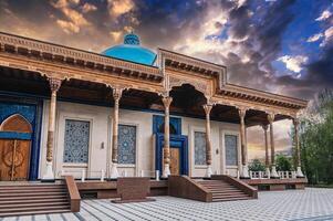 facade of the Museum of Victims of Political Repression decorated wooden carved columns and oriental Uzbek mosaics in Tashkent photo