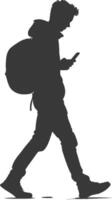 silhouette man walking while playing on smartphone black color only vector