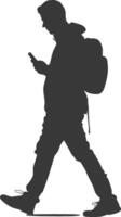 silhouette man walking while playing on smartphone black color only vector