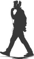 silhouette man walking while listening to headset black color only vector