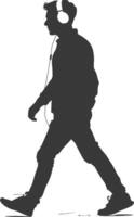silhouette man walking while listening to headset black color only vector