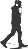 silhouette man walking while listening to headset black color only vector