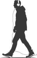silhouette man walking while listening to headset black color only vector