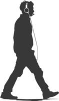 silhouette man walking while listening to headset black color only vector