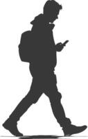 silhouette man walking while playing on smartphone black color only vector