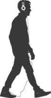 silhouette man walking while listening to headset black color only vector