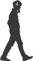 silhouette man walking while listening to headset black color only vector