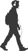 silhouette man walking while listening to headset black color only vector