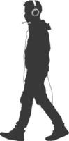 silhouette man walking while listening to headset black color only vector