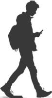 silhouette man walking while playing on smartphone black color only vector