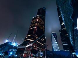 High skyscrapers of Moscow city on background of the night sky photo