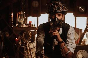man of engineers in a steampunk suit with a top hat with glasses and a gas mask photo
