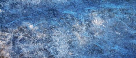 Ice surface of the river. Texture of ice shards. Winter background photo