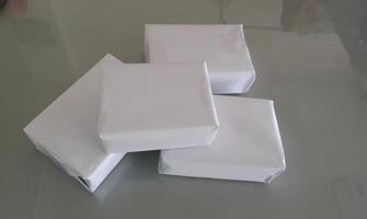 White cardboard boxes are stacked photo
