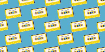 80s, 90s retro elements. Pattern with audio cassettes and geometrical elements in the Memphis style vector