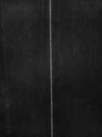 Folded paper with grungy texture in black background. can be used to replicate the aged and worn look for your creative design. old paper for photo texture overlay in retro style