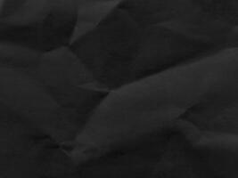 Crumpled and folded Black Paper Texture Images for background logo text template design photo