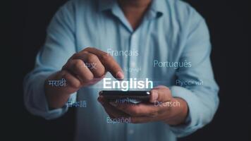Person use smartphone with Translator app, Translator app, language course and e-learning concept, Translation or translate on the mobile app worldwide language conversation speaking concept. photo