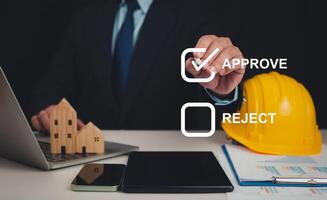 Approved Buildings Permit concept with approved residential building project, Architect or engineer Checking the list of documents and approving the project, Construction project inspection. photo