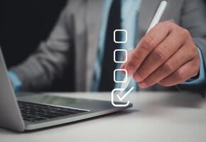 Businessman checks transaction documents or electronic contract documents, Prepare check and approve concept, Check electronic documents on digital documents and checklist approval. photo