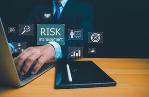 Risk Management and Assessment for Business Investment Concept, Risk management concept, Strategy and analyzing financial data on a virtual screen, Risky business risk management control and strategy. photo