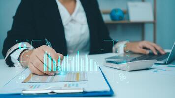 people use computers to analyze business and manage corporate data, business analytics with charts, metrics and KPIs to improve organizational performance, marketing, financial organization strategy. photo