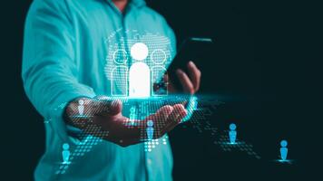Businessman use smartphone with global structure customer network technology, Customer Relationship Management, Data exchanges development. Customer service, Social media, Digital marketing online. photo