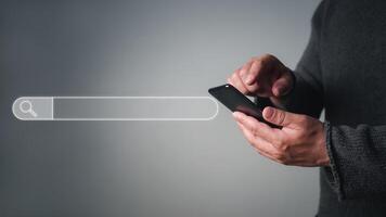 Man use cell phone to search data on internet finding information Website online, Search Engine Optimization, Searching information online, Concept of SEO, Search Engine Optimization. photo