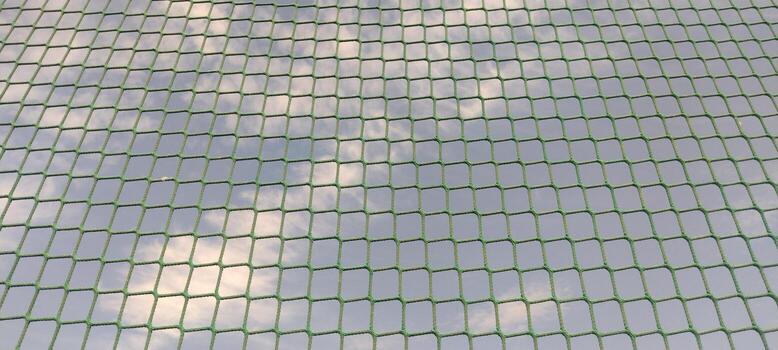 Rope net. String net on sky background, sports inventory photo